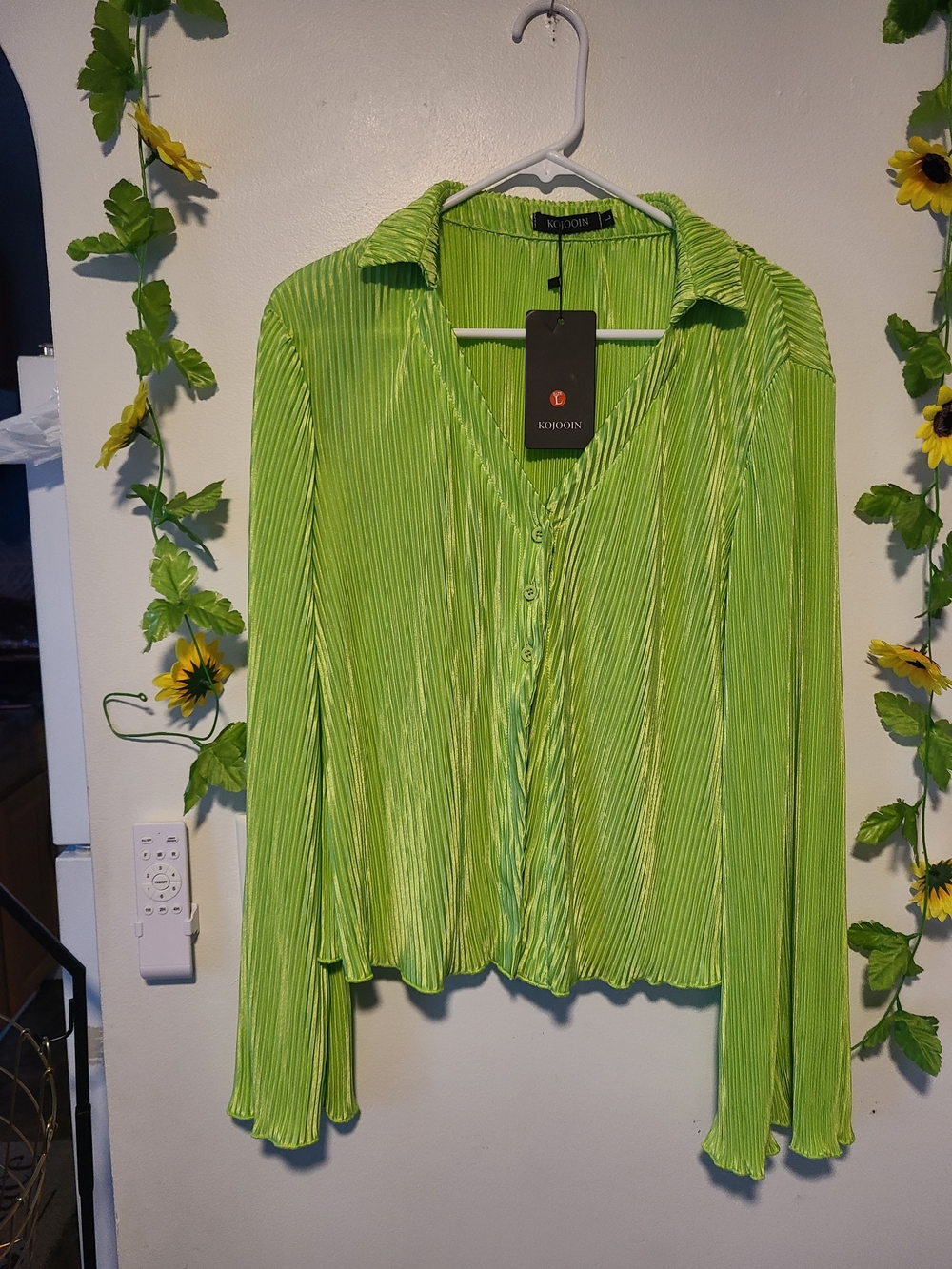 KOJOOIN lime green pleated button-down shirt featuring structured plissé fabric,